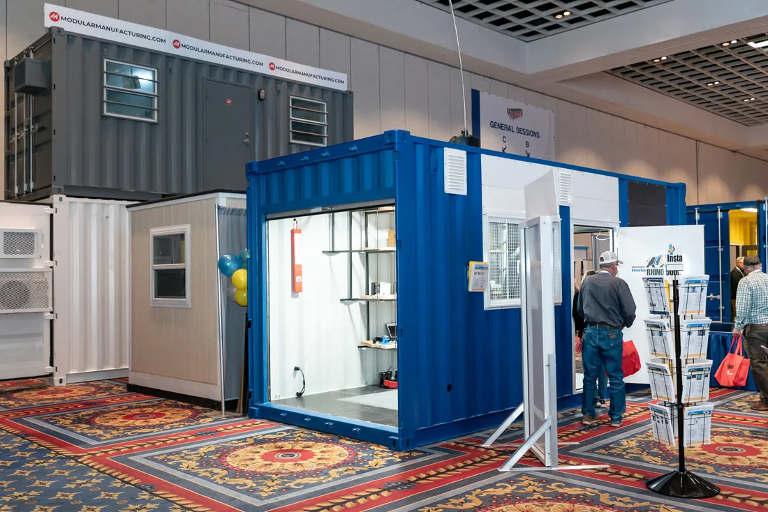 A blue container office on the 2025 NPSA trade show floor